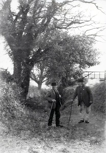 Two gentlemen chatting in country lane at Upperton, Sussex, c1935