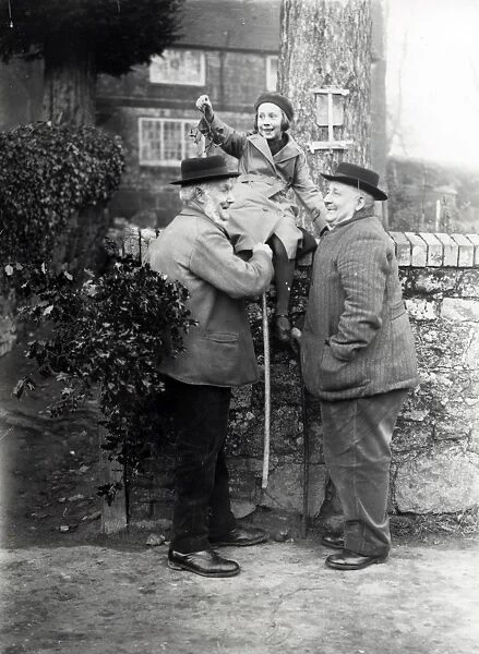 Two gentlemen and a girl on a gate in Upperton, Sussex