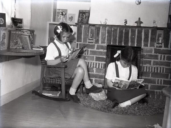 Two girls reading at Lancastrian Infants School, Chichester, May 1956
