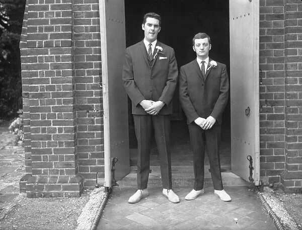 Groom and Best Man in doorway. Chichester Photographic Collection
