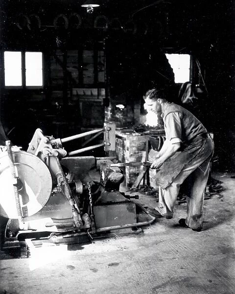 Halnaker Blacksmith at work - 16 May 1945