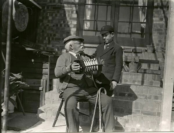 Old man with his accordian, April 1938