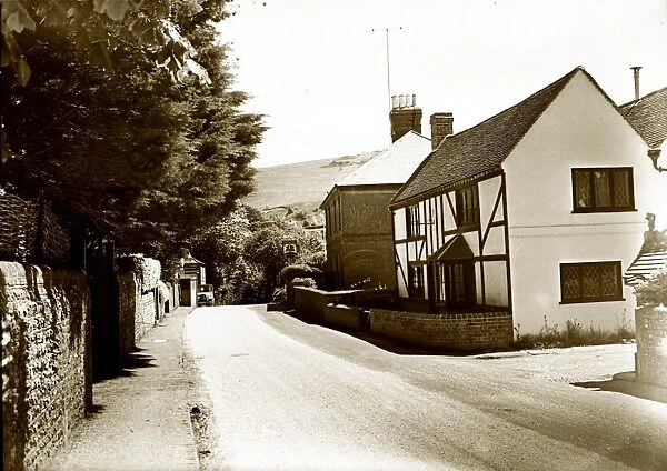 Poynings village with Tamplins Royal Oak pub at end of street