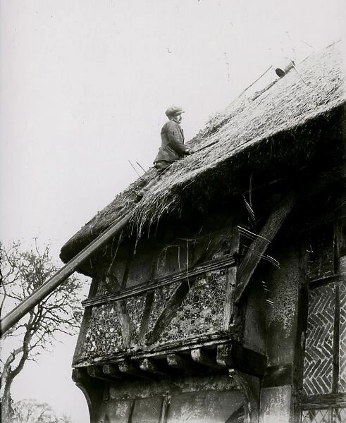 Roof thatching on Bignor General Shop, February 1938
