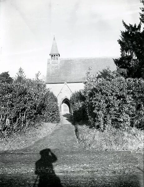 Shadow of a man looking at Southwater Church, 1 December 1951