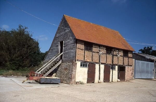 Wooden and brick barn at Bailing Hill Farm, Warnham, West Sussex