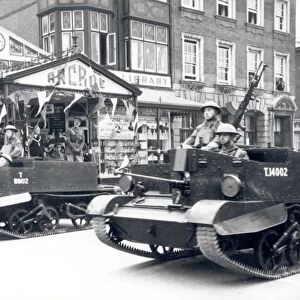 Bren Gun Carriers parading past The Arcade, Bognor, 1941