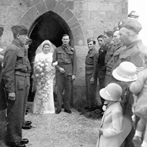 Bride and Groom outstide church in Sussex, June 1941
