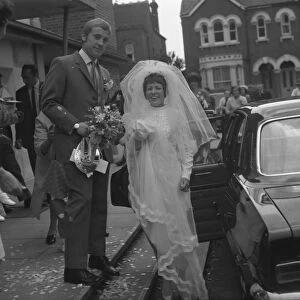 Bride and Groom standing outside St Richards Church, Chichester