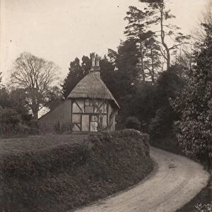 Brightling: thatched cottage on hill, 1908