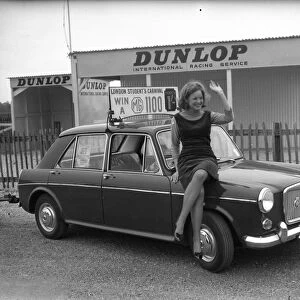 Female student posing with an MG 1100