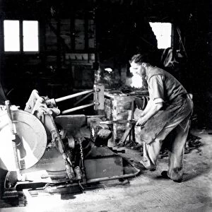 Halnaker Blacksmith at work - 16 May 1945