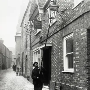 Lamplighter in Lombard St. Petworth, 1931