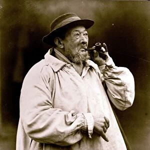 Old Shep lighting his pipe, January 1925