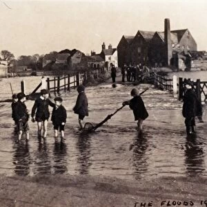 Old Mill at Sidlesham, surrounded by floods. 1910