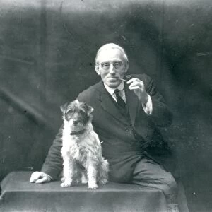 Portrait of elderly gentleman with his dog, December 1928