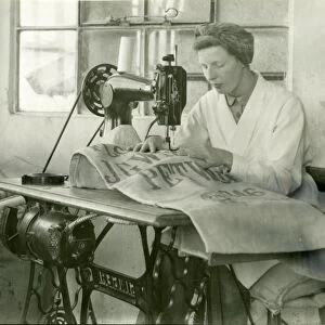 Sack mending by machine, Coultershaw Mill, Petworth, August 1949