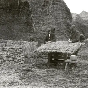 Thatching hurdles for a lambing fold, February 1934