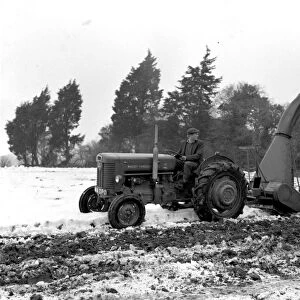 Tractor clearing snow on farm, 29 January 1963