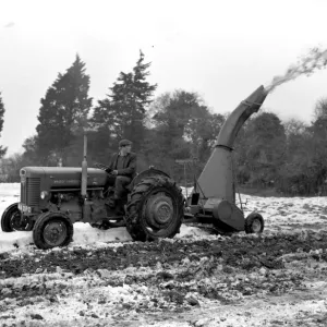 Tractor clearing snow on farm, 29 January 1963