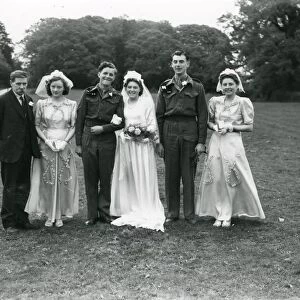 Wedding party at Ebernoe, Sussex. Groom and Best Man in army uniform, 1940s