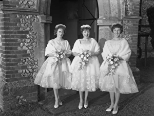 3 Bridesmaids outside Church