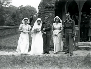 Bridal party, groom and best man in army uniform at Ebernoe, Sussex, 1940s Bridal party, groom and best man in army uniform at Ebernoe, Sussex, 1940s