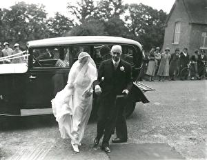 Bride with father arriving at the church, June 1936 Bride with father arriving at the church, June 1936