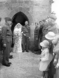 Bride and Groom outstide church in Sussex, June 1941 Bride and Groom outstide church in Sussex, June 1941