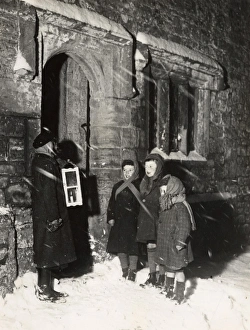 Boots Prints: Carol singers in the snow at Soanes farmhouse, Sussex
