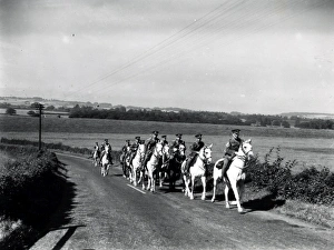 Uniform Prints: Cavalry riding on Duncton Hill. August 1936