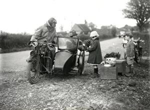 Images Dated 5th December 2012: Children selling wild flowers to motorists, April 1927