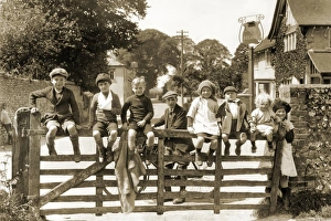Children sit on a gate, Salvington Road, Durrington, Worthing