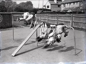 Images Dated 17th September 2014: Children upside down on climbing frame, Lancastrian Infants School, Chichester, May 1956