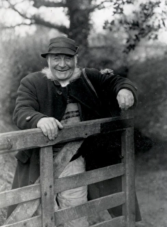 Beard Prints: Country gentleman standing behind gate, Upperton, West Sussex