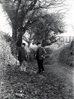 Images Dated 24th July 2013: Two country gentlemen chatting in country lane, Upperton, Sussex