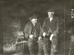 Two elderly gentleman having a drink in an inn at Lurgashall, February 1934 Two elderly gentleman having a drink in an inn at Lurgashall, February 1934