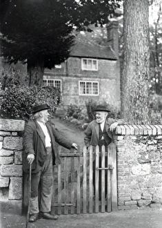 Lane Prints: Two elderly gentlemen chatting over a gate at Upperton, Sussex, 1935