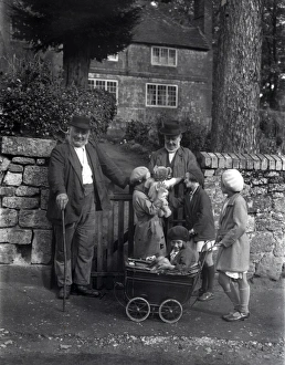 Two elderly gentlemen and four young girls chatting in Upperton, Sussex, 1935 Two elderly gentlemen and four young girls chatting in Upperton, Sussex, 1935