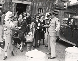 Beret Prints: Evacuees outside hall, September 1939