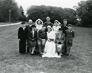 Family group with bride and groom at a wedding in Ebernoe, 1940s Family group with bride and groom at a wedding in Ebernoe, 1940s