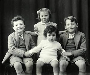 Family portrait of four children - 5 December 1945 Family portrait of four children - 5 December 1945