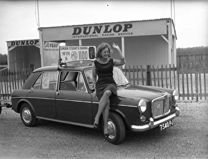 Female student posing with an MG 1100 Female student posing with an MG 1100