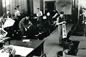 Filling ballot boxes in Council Chamber in first post-war election Filling ballot boxes in Council Chamber in first post-war election