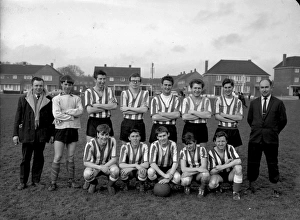 Football Team posing for group photograph, 1960s Football Team posing for group photograph, 1960s