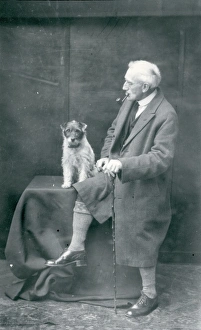 Glasses Prints: Gentleman smoking a pipe and dog