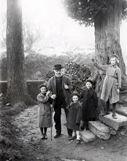 Beard Prints: Group of people in holly woods at Upperton, Sussex, December 1935