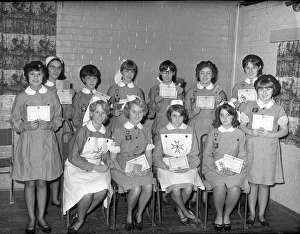 Uniform Prints: Group of St Johns Ambulance nurses holding up certificates