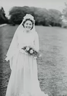 Images Dated 14th August 2013: Happy Bride at Ebernoe, Sussex in the 1940s