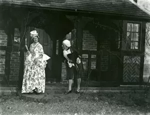 Images Dated 22nd August 2014: Lady and gentleman posing in fancy dress, February 1938